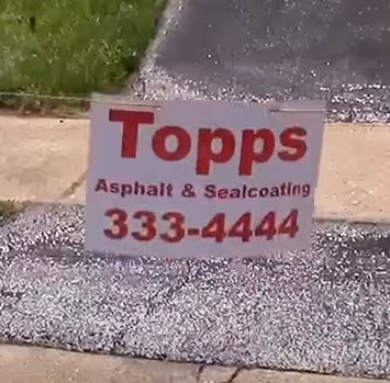 Roping off an asphalt driveway