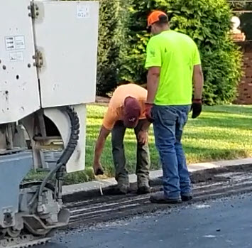 Asphalt Milling Along Concrete Rolled Curbs